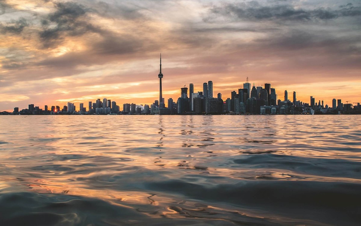 Skyline of a city behind a body of water