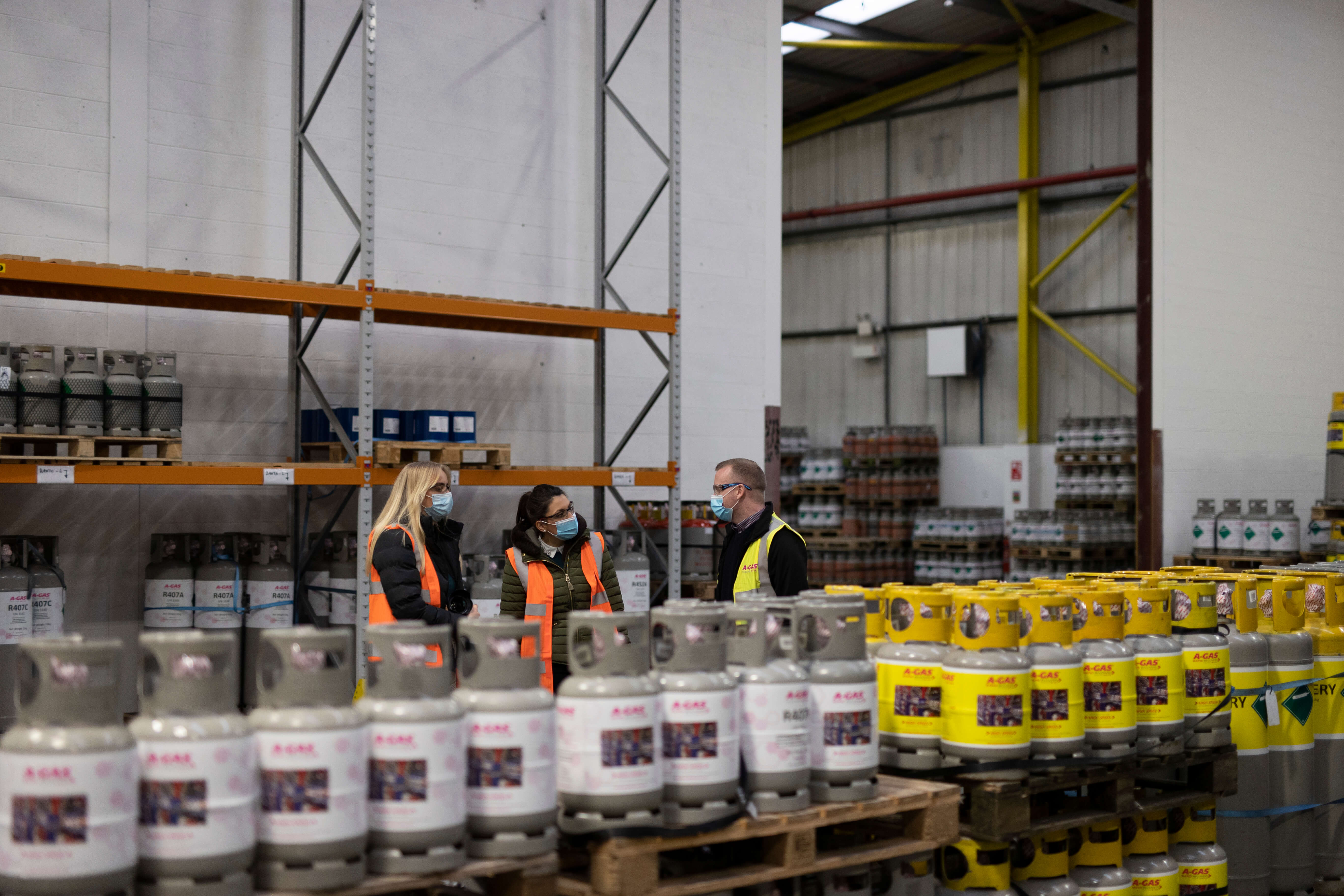 meeting taking place in a cylinder warehouse