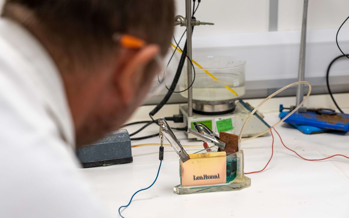 Man looking at scientific lab equipment