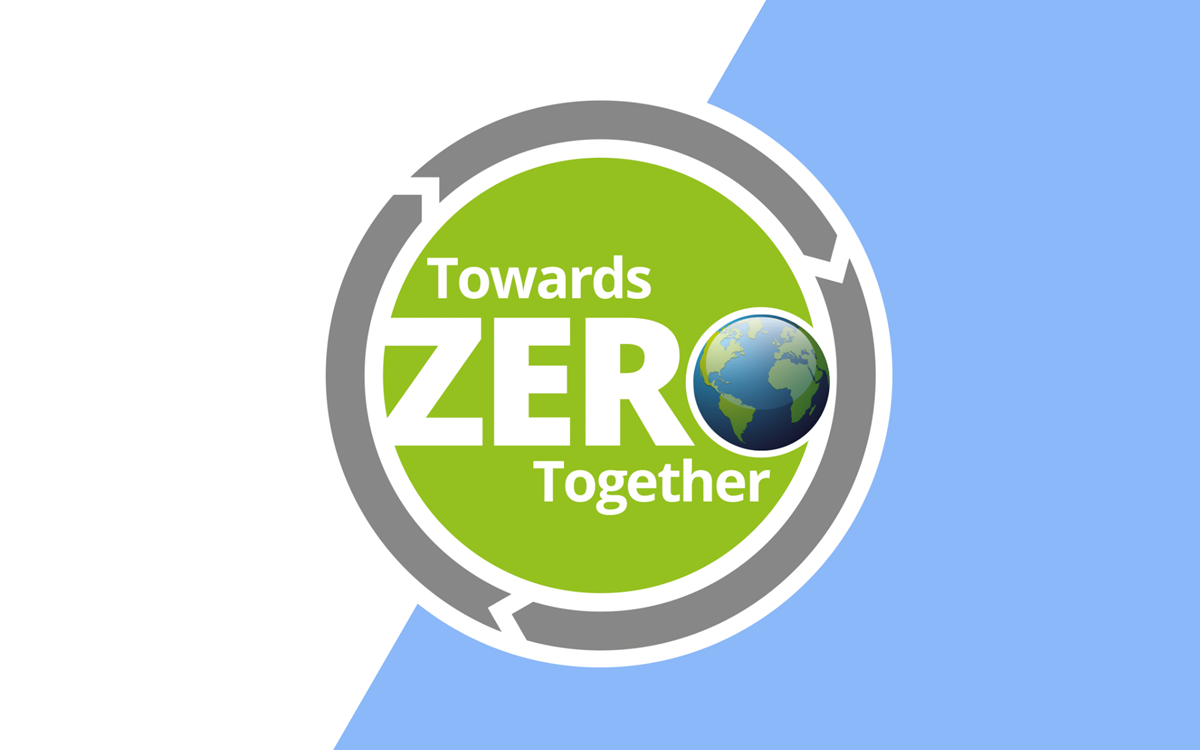 White text on a green and grey circle on a blue and white background