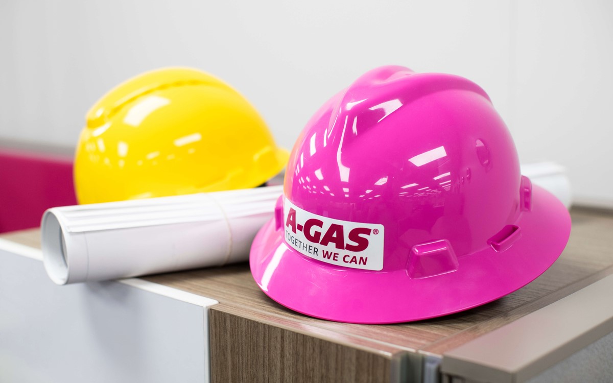 A-Gas branded hardhats in a cowboy hat style